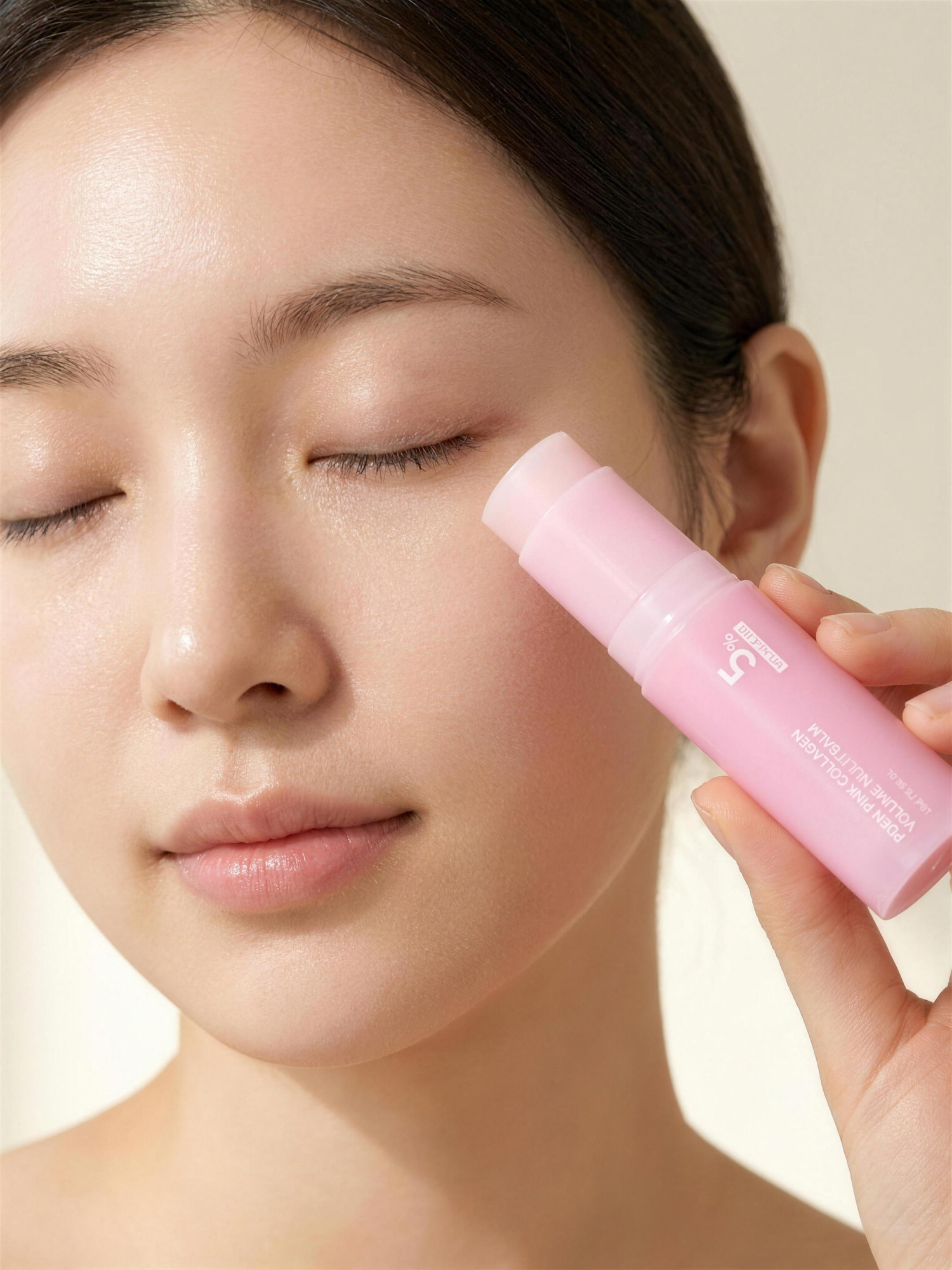 Applying the Aurelly Collagen Glow Multi-Balm beneath the eye