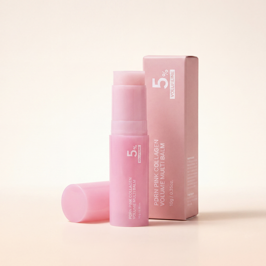 Aurelly Collagen Glow Multi-Balm — uncapped pink twist-up stick with cap and retail box on warm ivory background